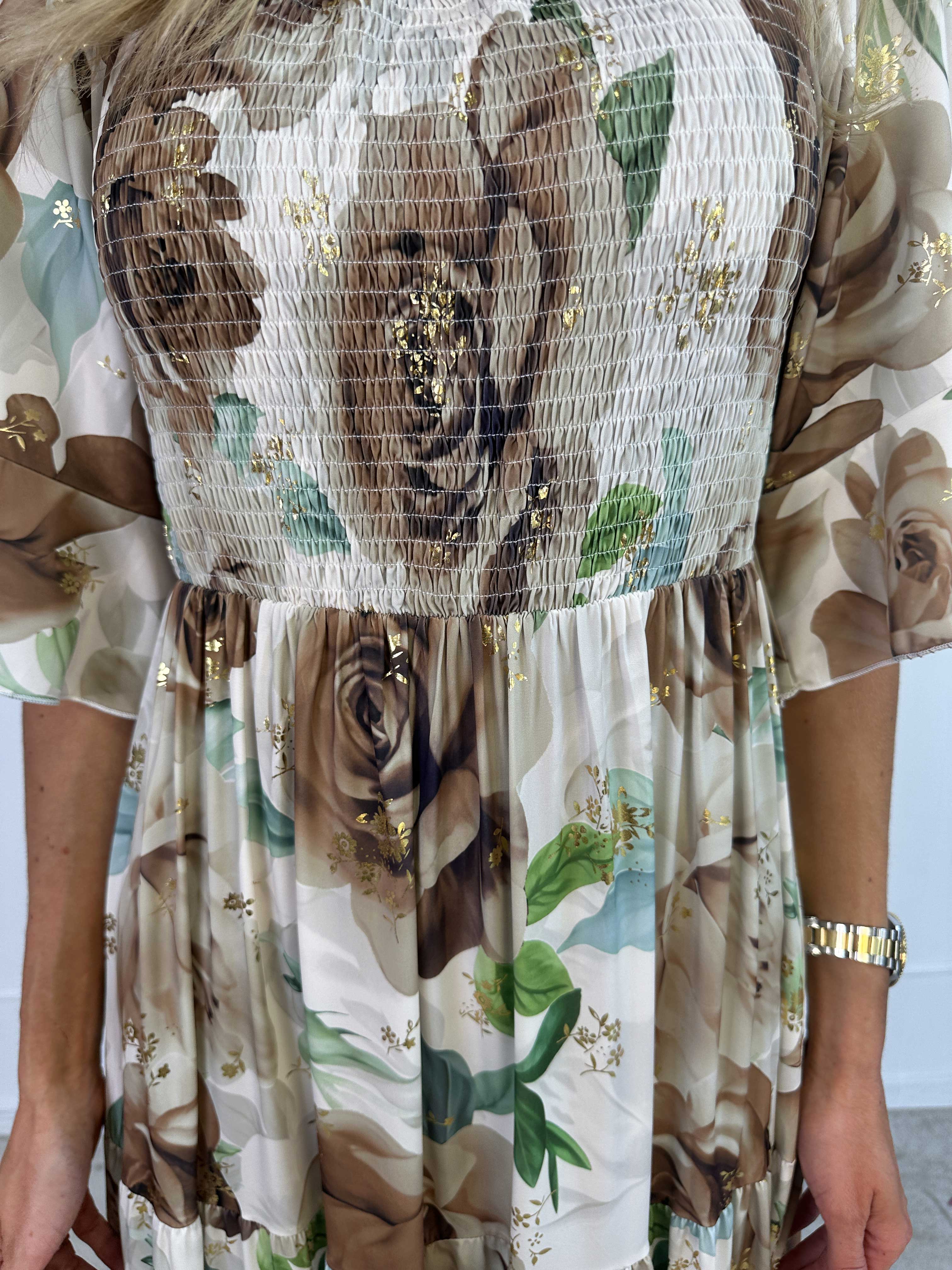 Elna Flower - Blomstret elastisk kjole med smock over brystet